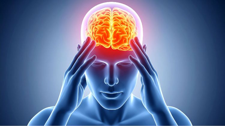 Person holding head with headache