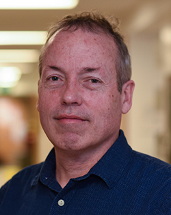 Headshot of David Ginty