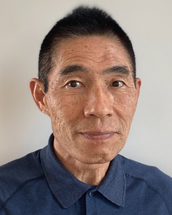 Headshot of Kenji Doya
