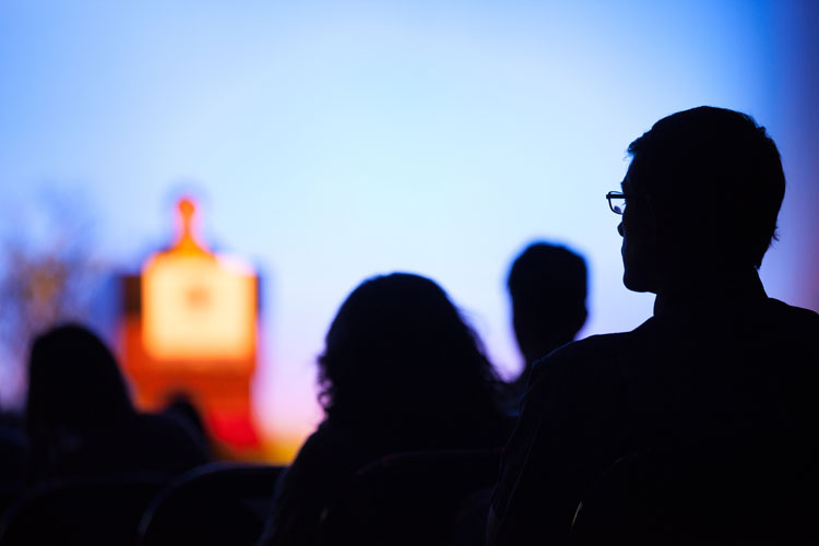 Attendees listening to a lecture at the annual meeting.