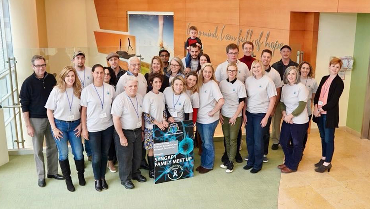 The SYNGAP1 Family Meet Up at Johns Hopkins University gathered patients and families living with the syndrome with researchers, including Richard Huganir (far left).