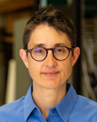 Headshot photo of Catherine S. Woolley