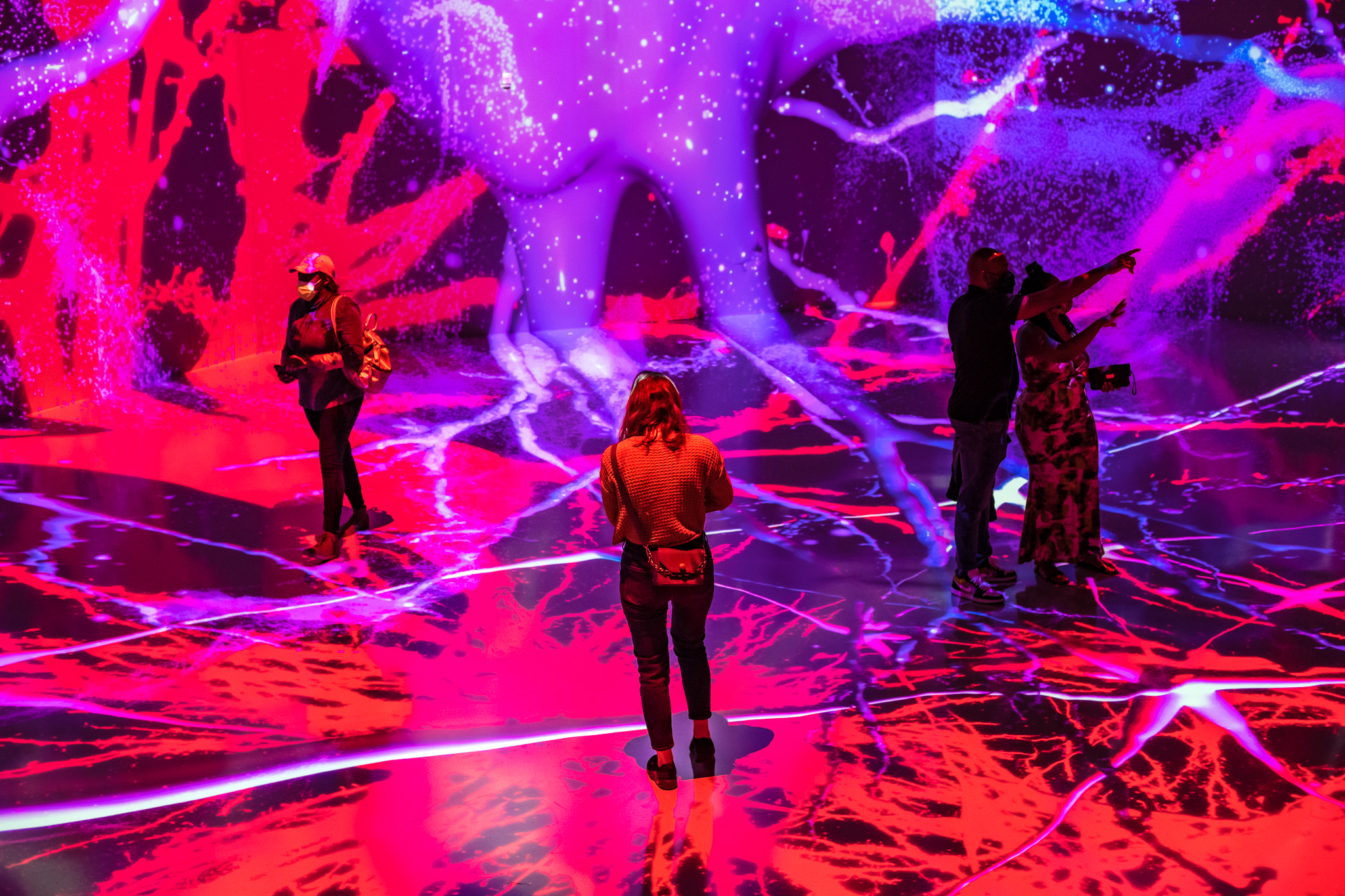 Image of an exhibit at ARTECHOUSE that depicts the process of vision.