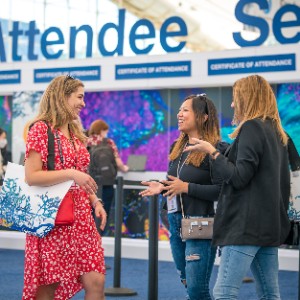Annual Meeting attendees talking to each other
