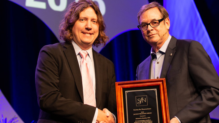 Michael R. Bruchas, PhD, of the University of Washington, accepts the Jacob P. Waletzky Award.