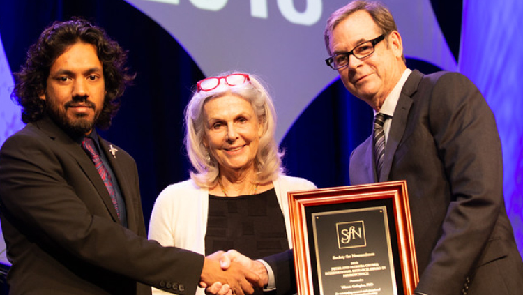 Vikram Gadagkar, PhD, of Cornell University, accepts the Peter and Patricia Gruber International Research Award.