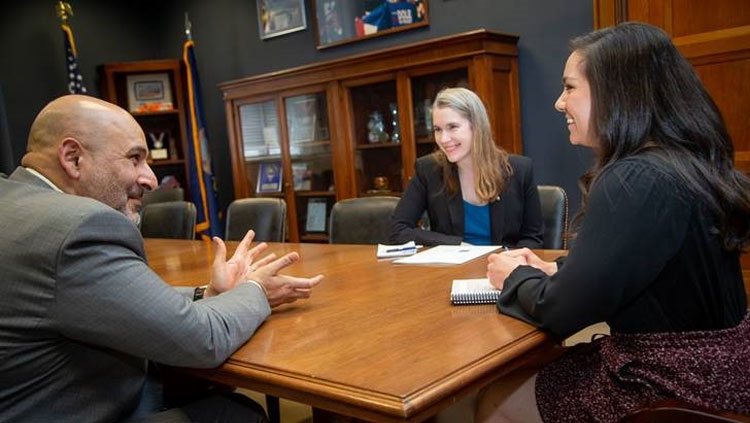 Two NeuroAdvocates in a meeting with a legislator at SfN Hill Day 2020