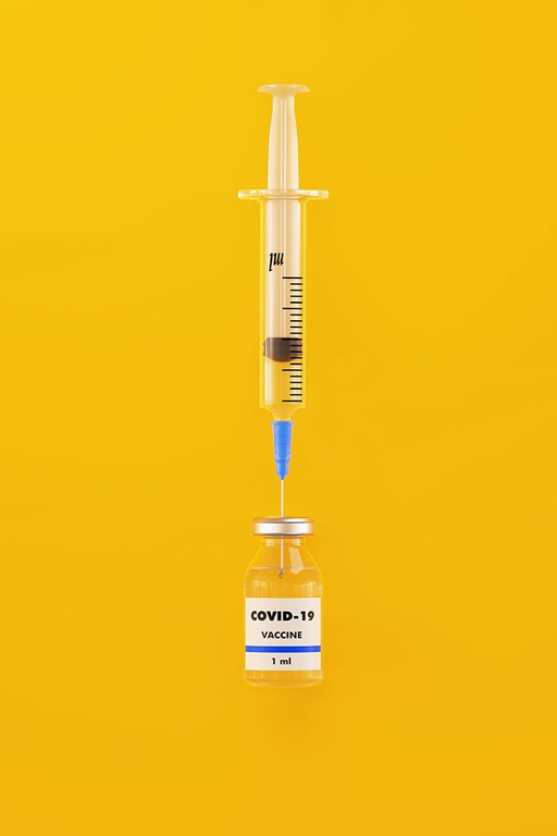 image of a syringe being filled with a covid-19 vaccine