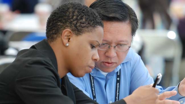 two people intently talking